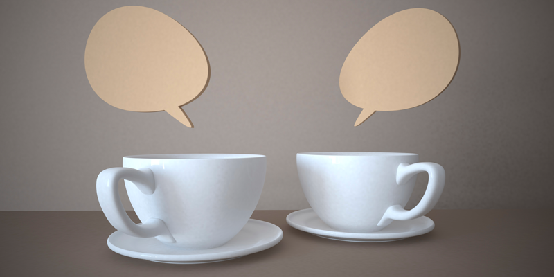 Two cups of tea with speech bubbles above